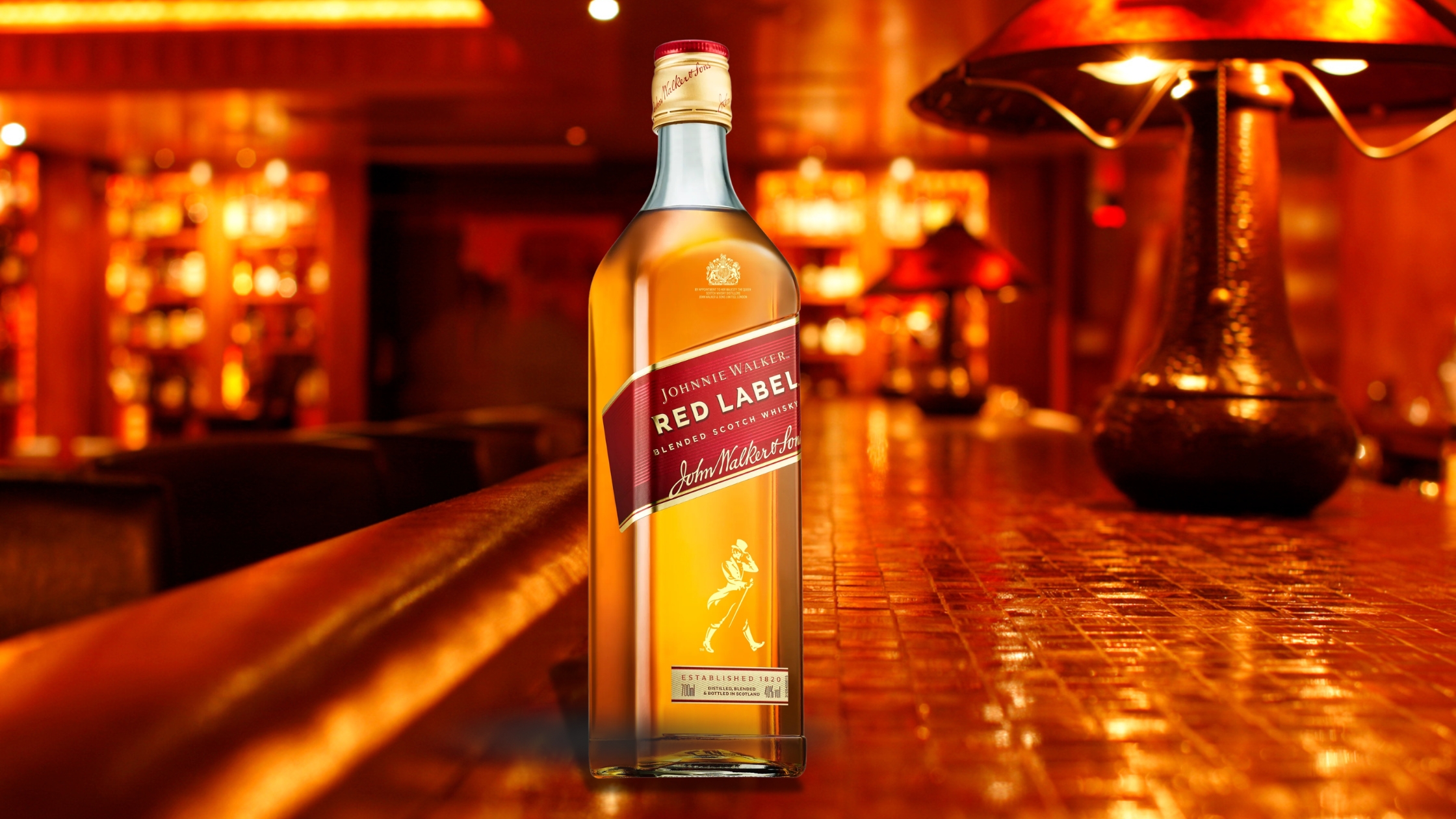 A bottle of Aperol and cocktail illustrations